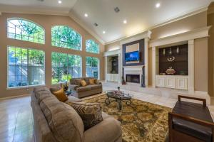 Apartments For Rent in Houston, Texas - Clubhouse Interior Seating Area with Couches, Fireplace and TV 