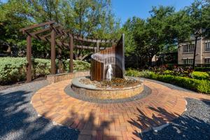 Apartments For Rent in Houston, TX - Outdoor Pergola and Fountain Up Close